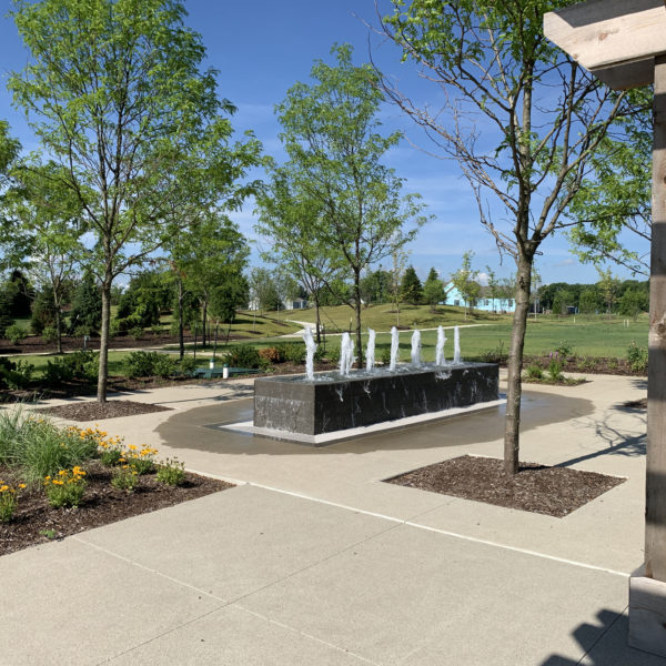 Fischer Design designed the amenity areas for the Serenade development that included entrance monuments, pigeonnier, open lawn, event space, playground, extensive landscaping, fire pits and water features.